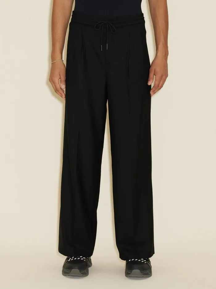 Trousers and Shorts Men Holzweiler Lan Trousers Black