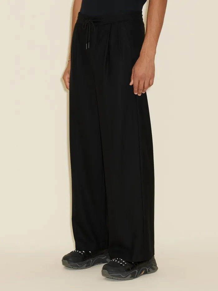 Trousers and Shorts Men Holzweiler Lan Trousers Black