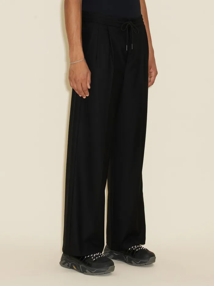 Trousers and Shorts Men Holzweiler Lan Trousers Black