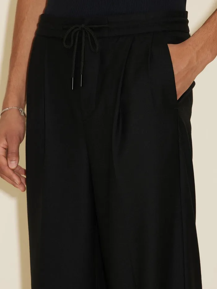 Trousers and Shorts Men Holzweiler Lan Trousers Black