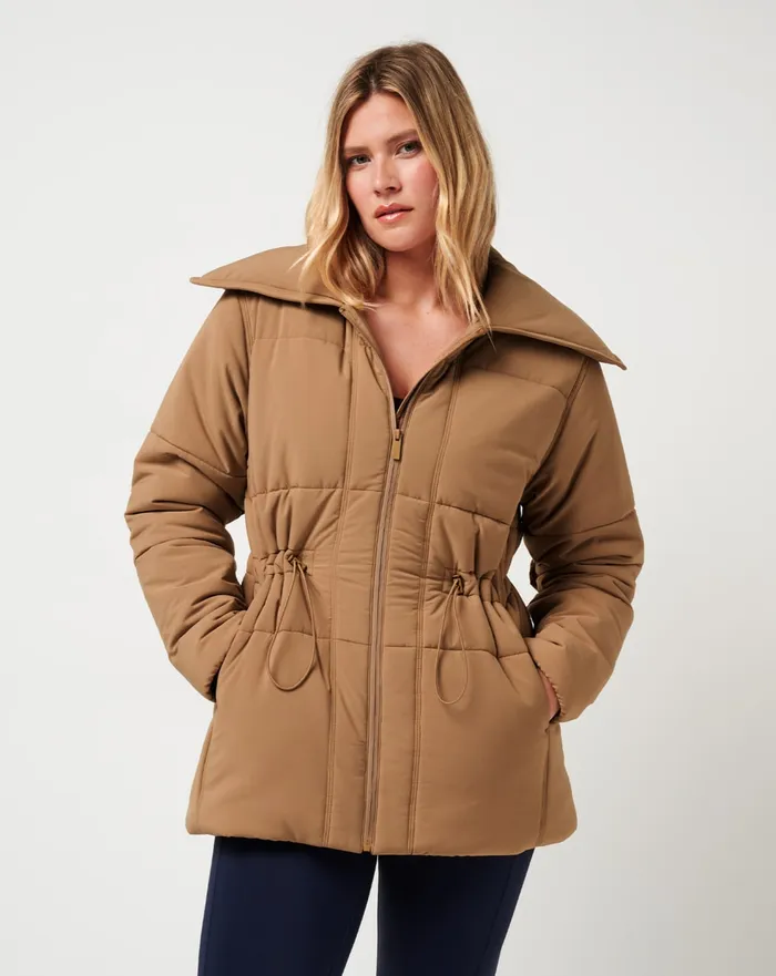 Women Jackets TravisMathew MONT BLANC LONG PUFFER Tigers Eye