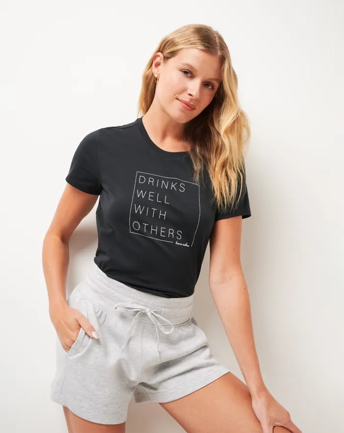 Women Tees TravisMathew DAY AT THE RACES GRAPHIC TEE Black